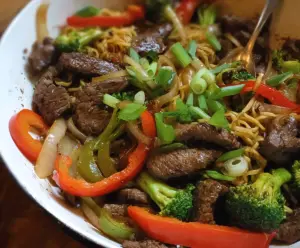 Delicious easy beef stir fry with colorful vegetables in a wok