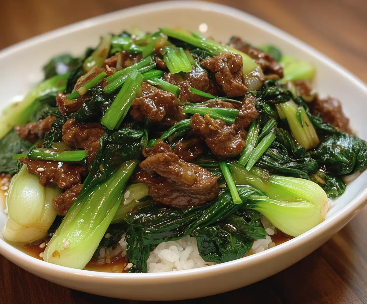 Delicious bok choy stir-fried with tender beef in a savory sauce, perfect for a quick Asian-inspired meal.