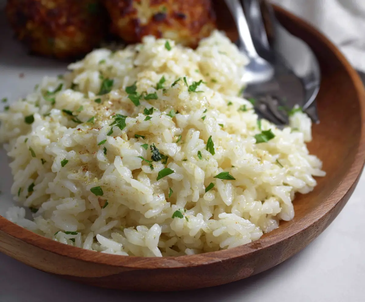Delicious Garlic Parmesan Rice served as a flavorful side dish
