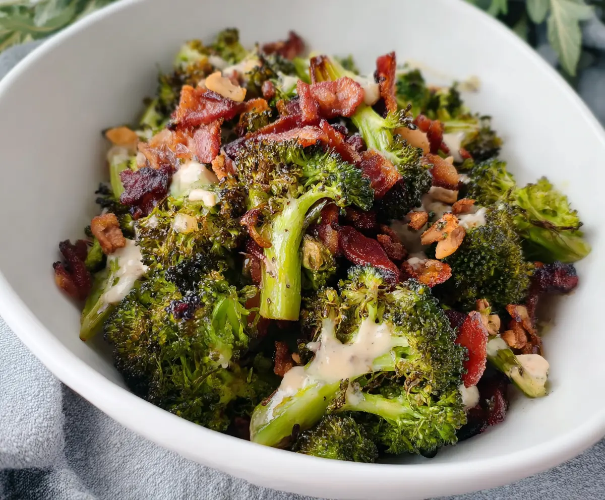Delicious roasted broccoli and crispy bacon crunch salad served on a plate
